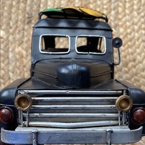 Classic Black Toy Truck with Surfboards